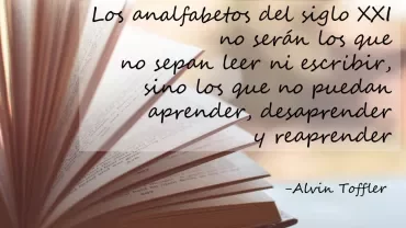 Libro abierto con cita de Alvin Toffler sobre aprender de nuevo.