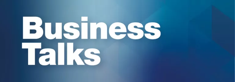 Texto 'Business Talks' en fondo azul